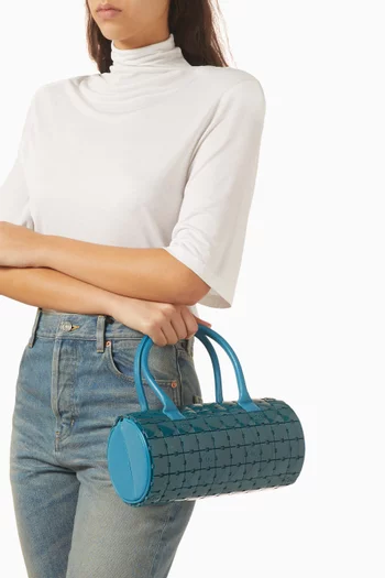 حقيبة يد لوسيت بازل أسطوانية من عام 2000–2002