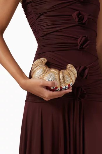 كلاتش على شكل كرواسون مرصع بالكريستال