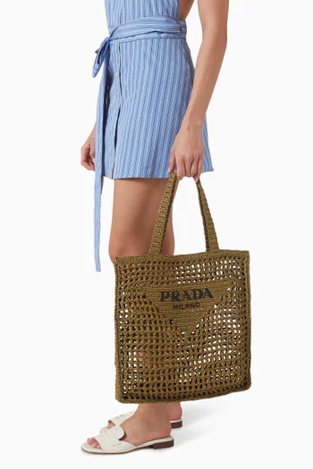 حقيبة يد بشعار الماركة كروشيه