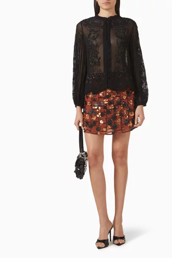 بلوزة التين شفافة مزينة بتطريزات جورجيت