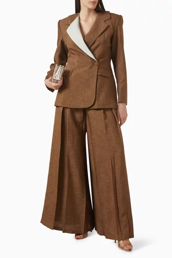 بنطال بقصة ساق واسعة وطيات