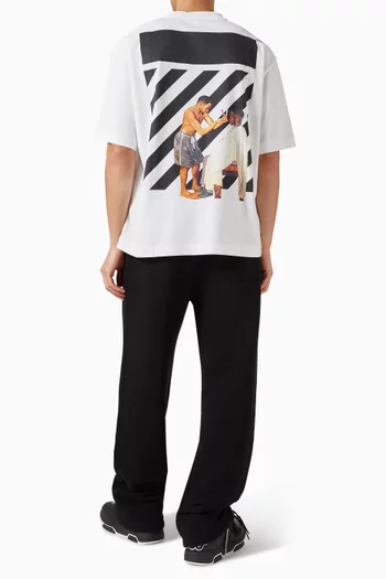 تي شيرت سكيت بطبعة حلاق وخطوط مائلة قطن