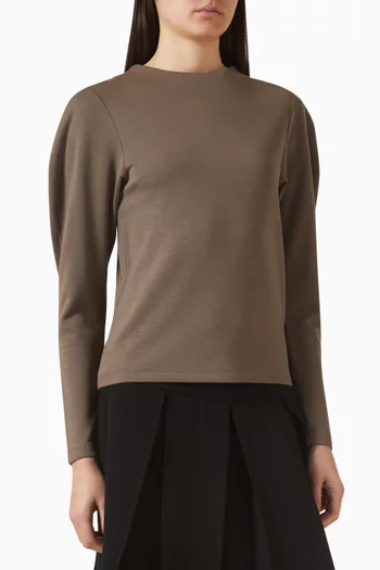 بلوزة بأكمام بتصميم دائري