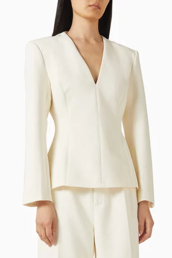 بلوزة بقصة مريحة وفتحة رقبة على شكل حرف V