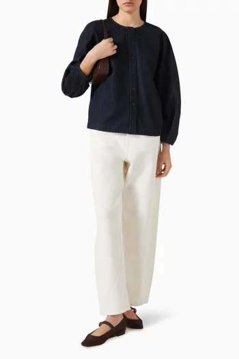 بلوزة دينم بقصة مستديرة