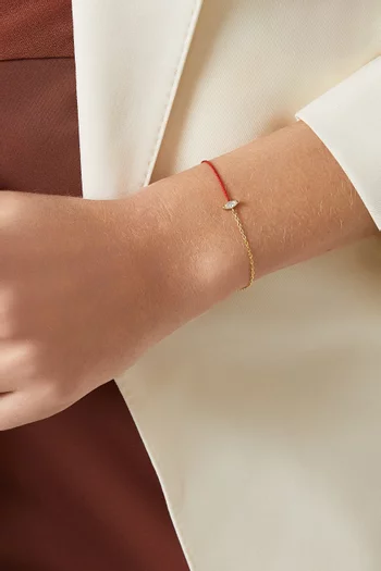 سوار بتصميم خيط مزين بماسة ماركيز ذهب عيار 18