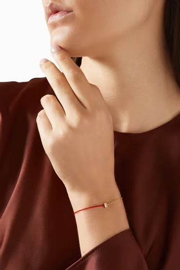 سوار بتصميم خيط مزين بماسة مستطيلة ذهب عيار 18