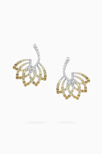 أقراط متدلية بتصميم زهرة اللوتس مرصعة بالياقوت والماس ذهب أبيض عيار 18