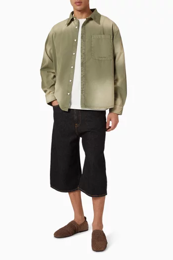 قميص بشعار الماركة وأجزاء باهتة قطن