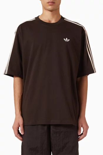 تي شيرت فضفاض بثلاثة خطوط قطن