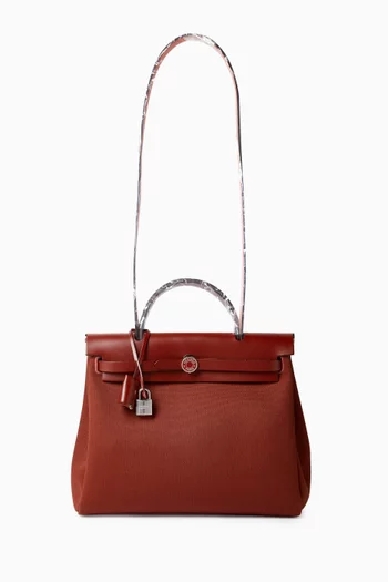 حقيبة هيرباج 31 بسحّاب جلد بقر غير مستعملة