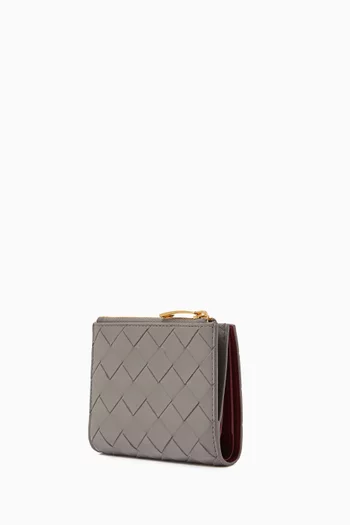 محفظة صغيرة ثنائية الطي بسحّاب جلد مجدول