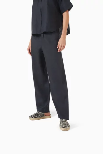 حذاء مفتوح من الخلف بكعب مسطح ونعل سميك شمواه جلد عجل