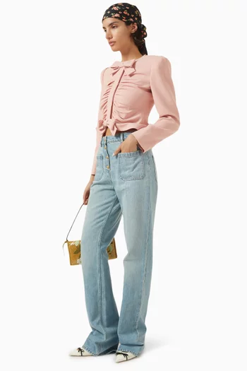 بنطال جينز بأزرار محفورة بشعار حرف V‏ دينم