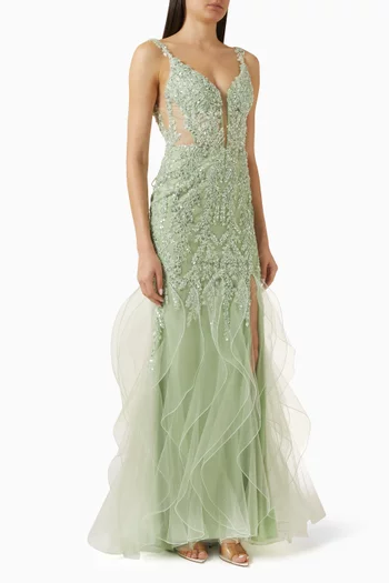 فستان سهرة بتصميم حورية بحر مطرز بالخرز