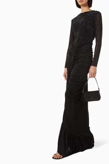 فستان بكشكش وتطريزات بأحجار الراين