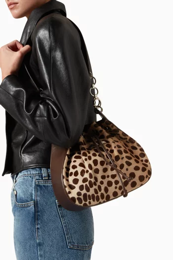 حقيبة باكيت بنقشة جلد فهد شعر مهر