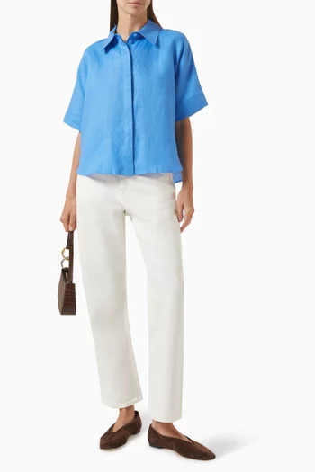 قميص بحافة مقوسة