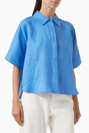 قميص بحافة مقوسة