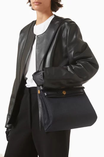 حقيبة هيرباج 31 بسحّاب توال وجلد بقر غير مستعملة