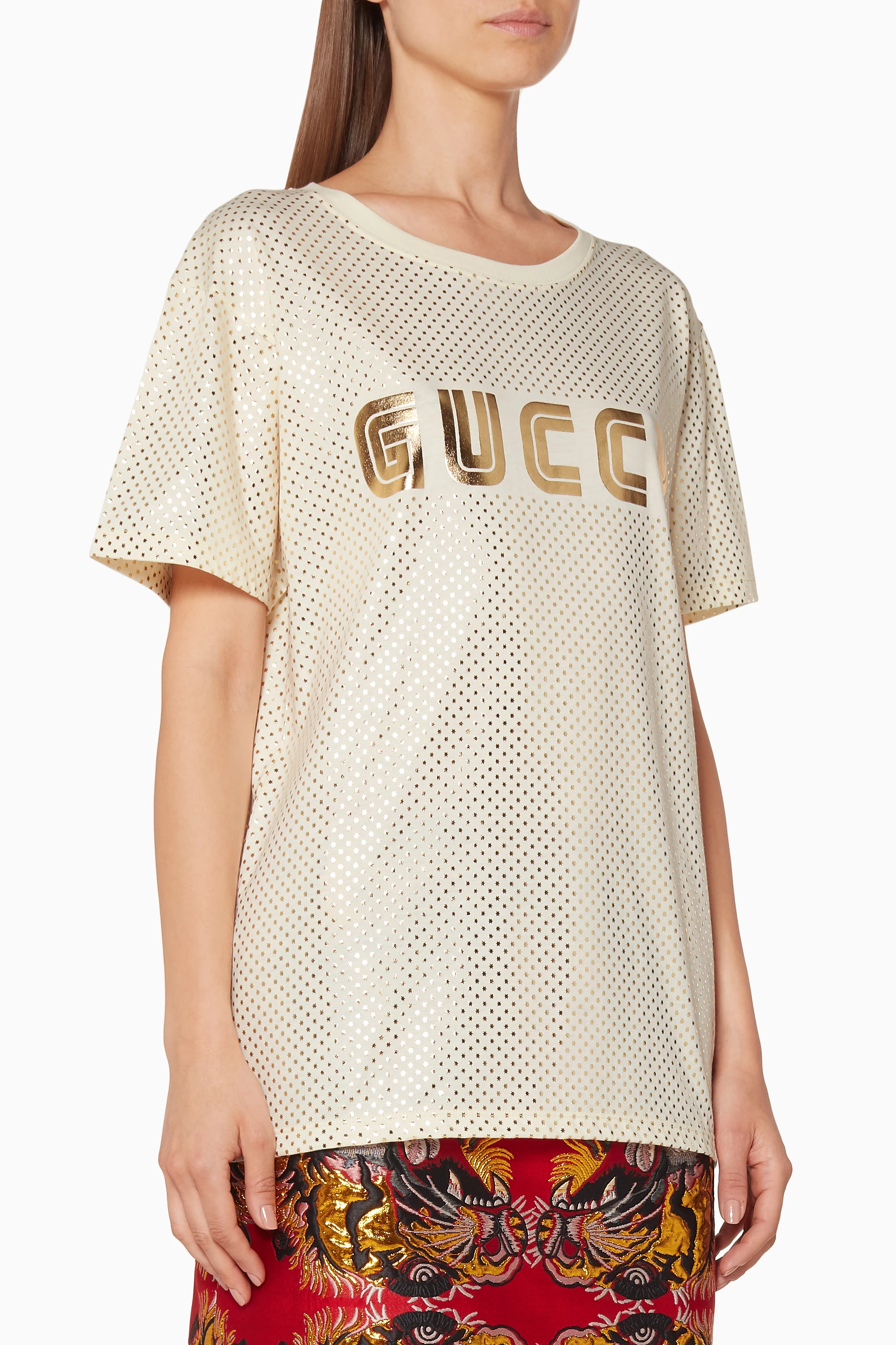 Buy Gucci Gold Ivory Guccy Print T Shirt for Women in Saudi Ounass