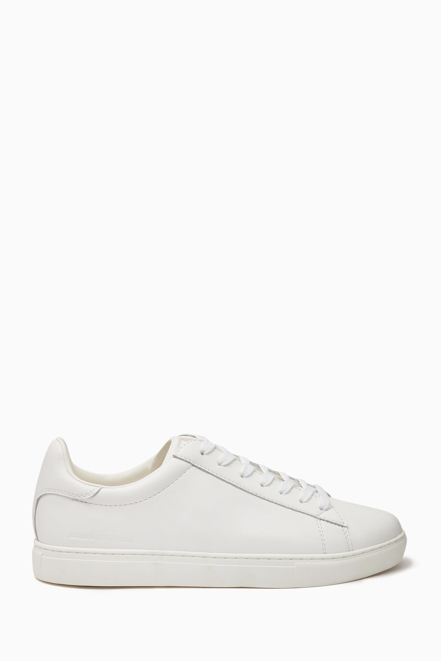 Buy Armani Exchange White Logo embossed Low top Sneakers in