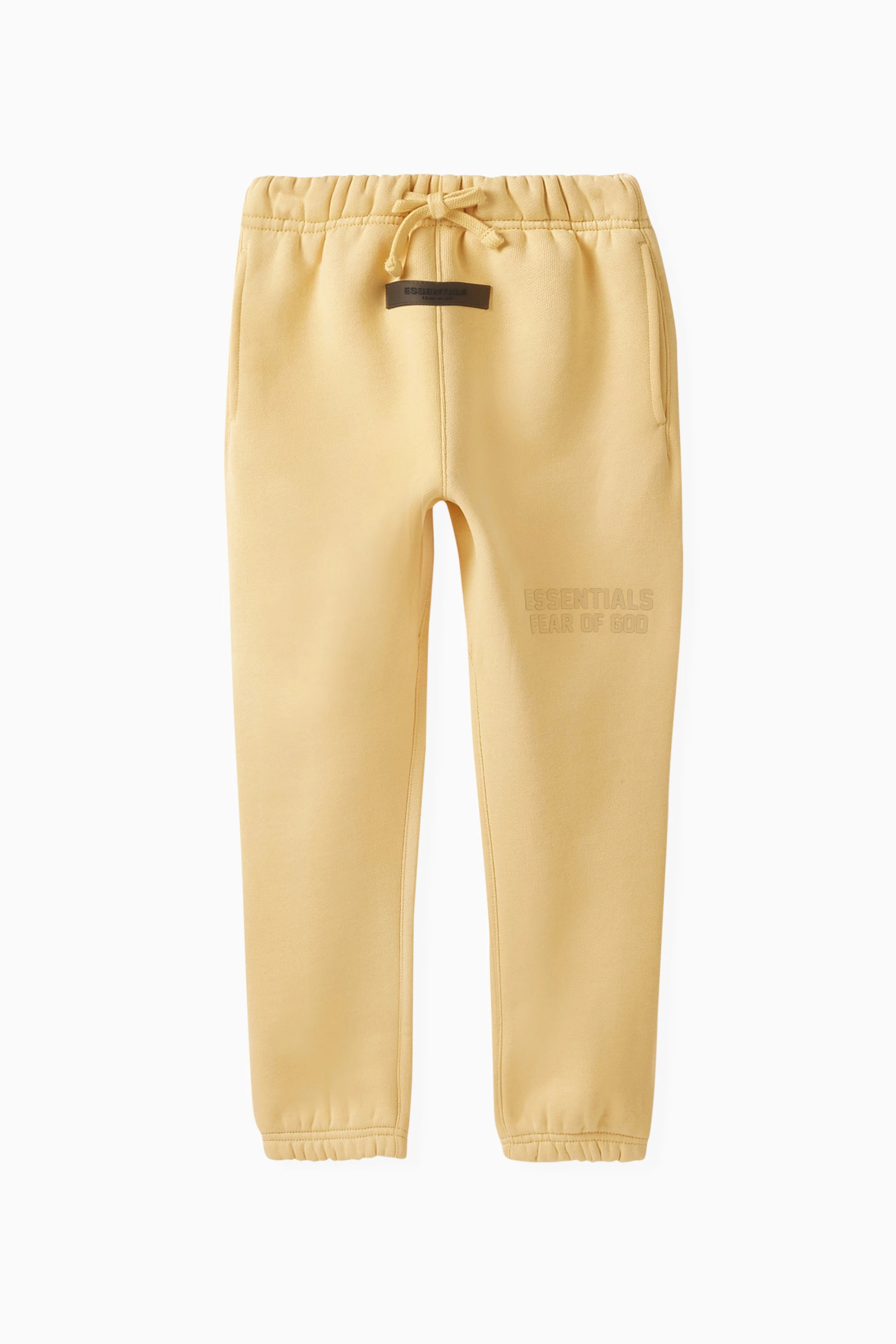 Fear of god essentials sweatpants yellow on sale