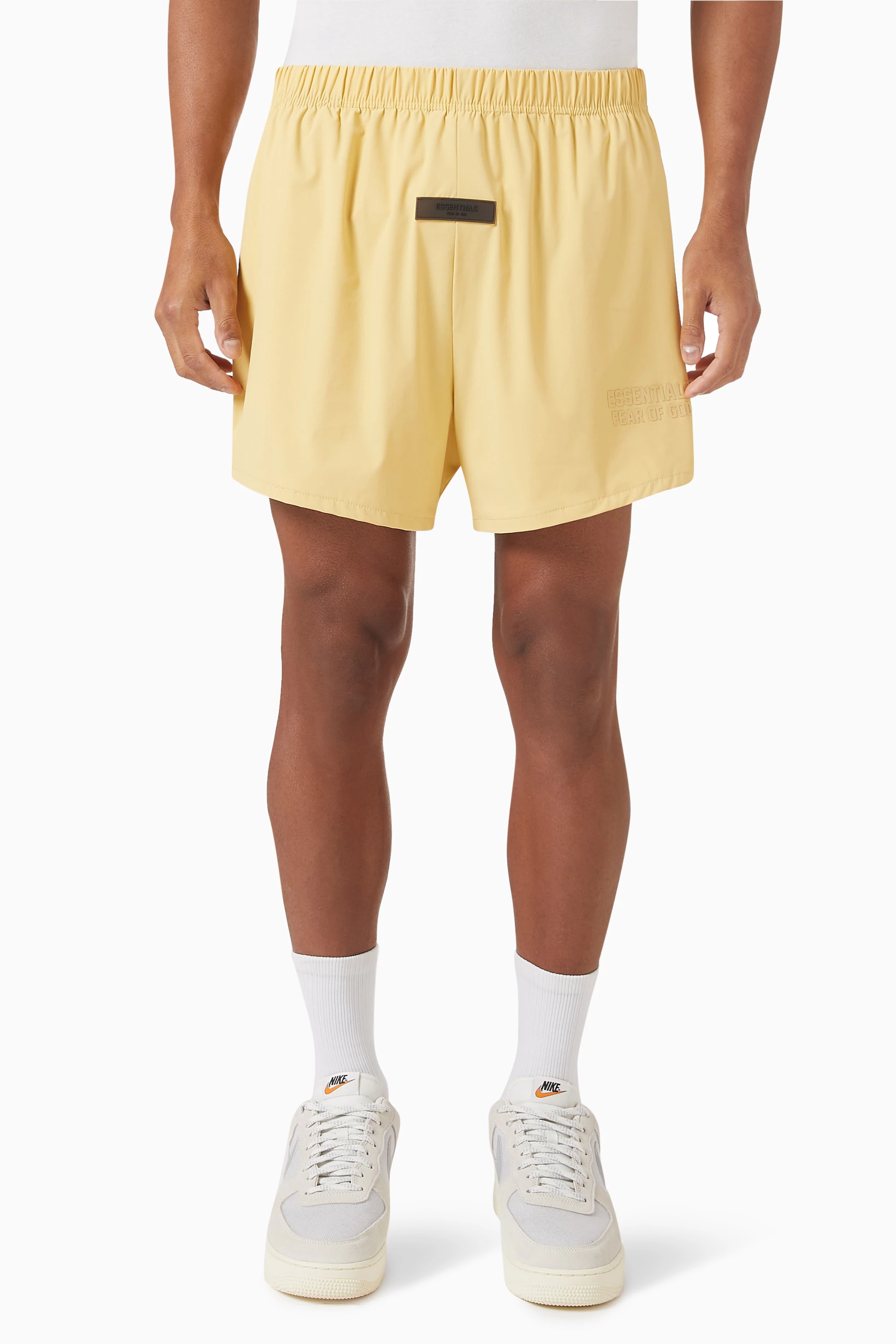 Nike essentials discount shorts in yellow