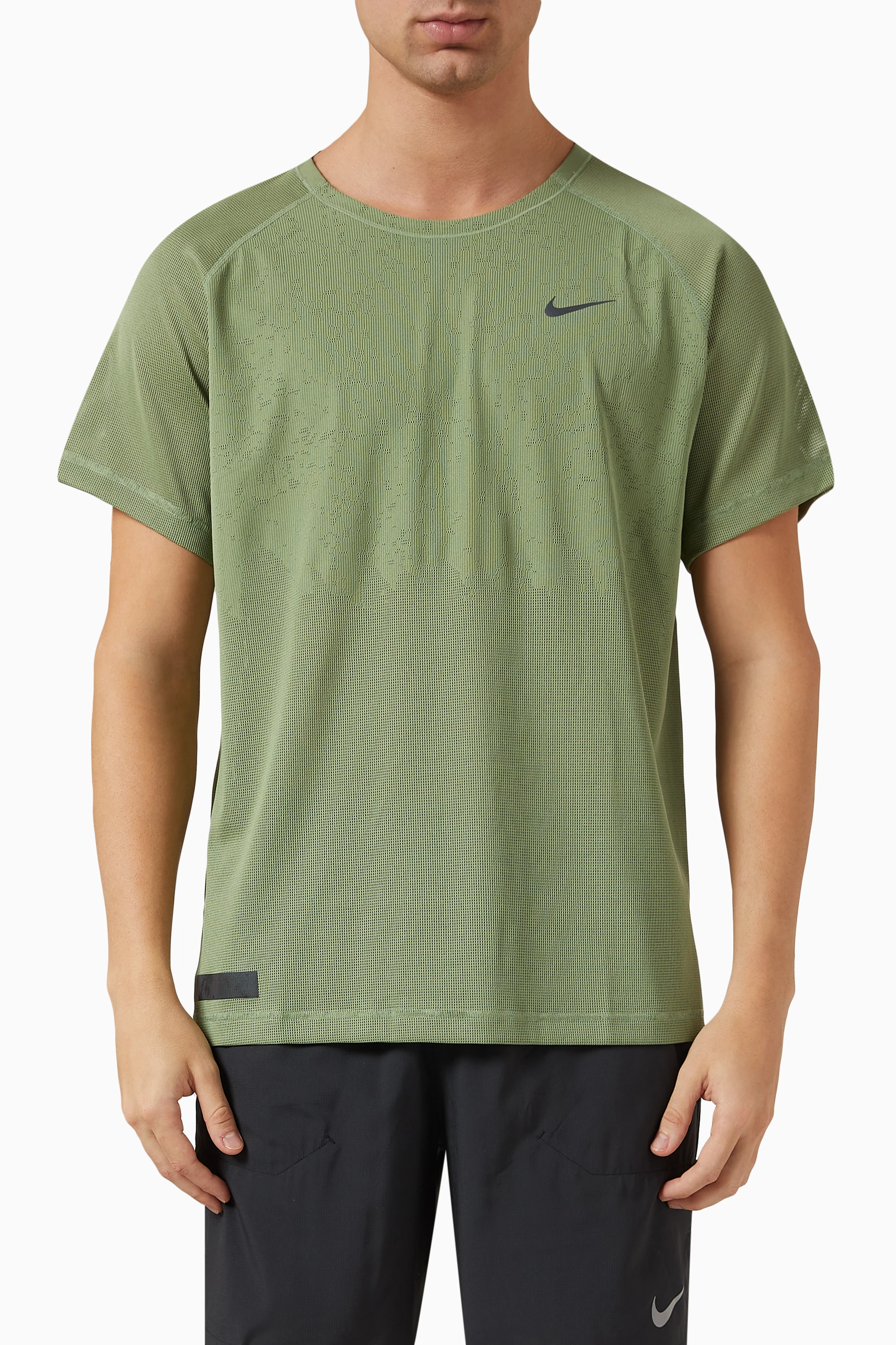 Nike green sales running top