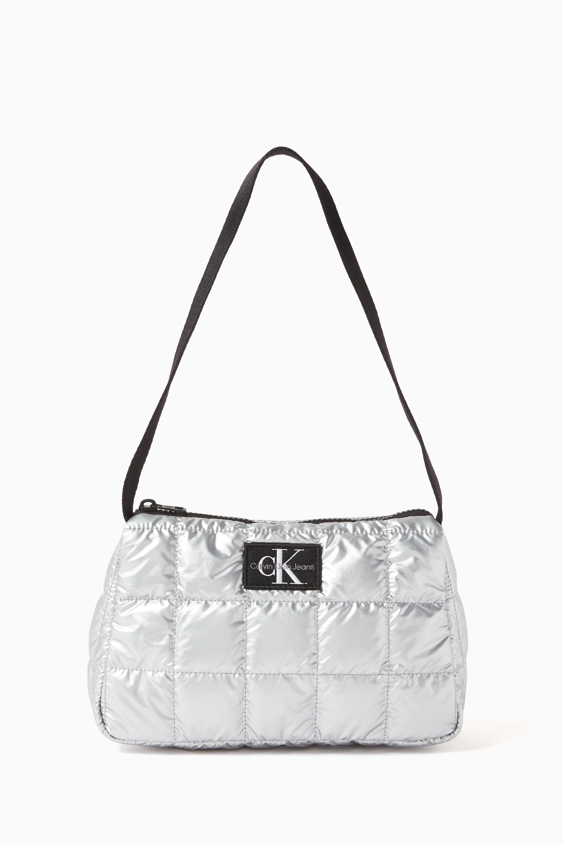 Buy Calvin Klein Silver Quilted Shoulder Bag in Recycled Nylon for