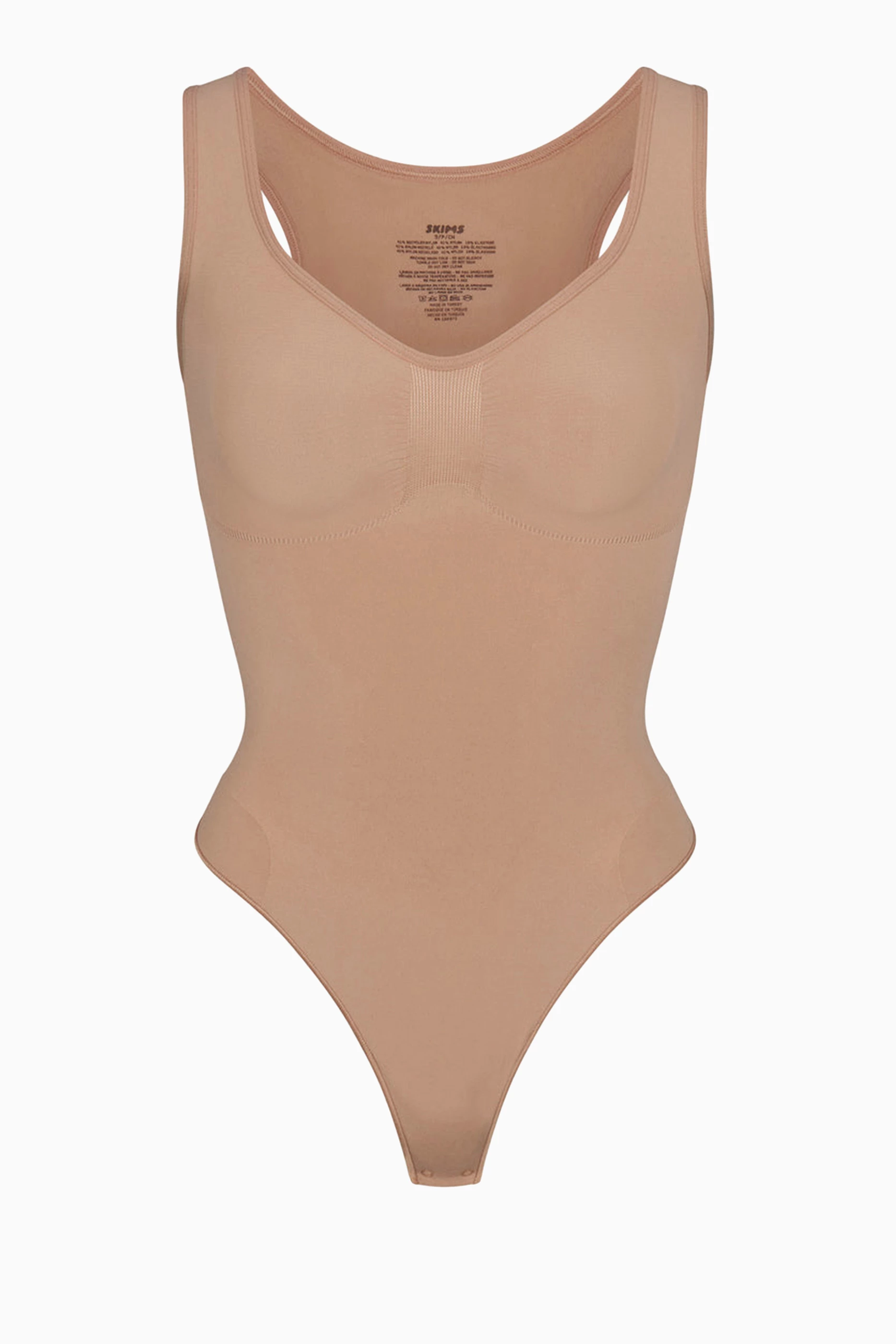 Buy SKIMS Brown Seamless Sculpt Scoop Neck Thong Bodysuit for Women in  Saudi