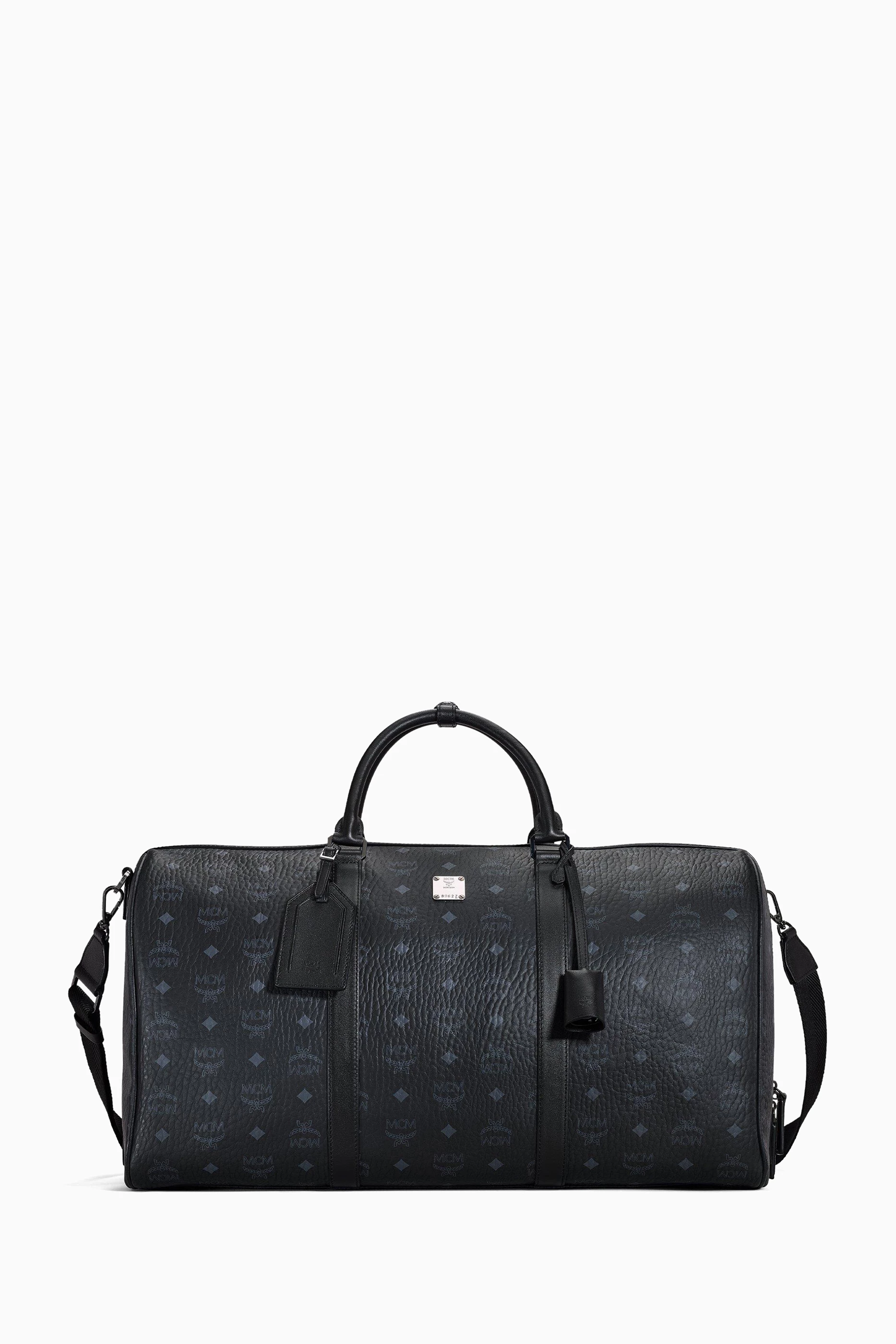 Buy MCM Black Ottomar Weekender 55 Bag in Coated Canvas for Men in