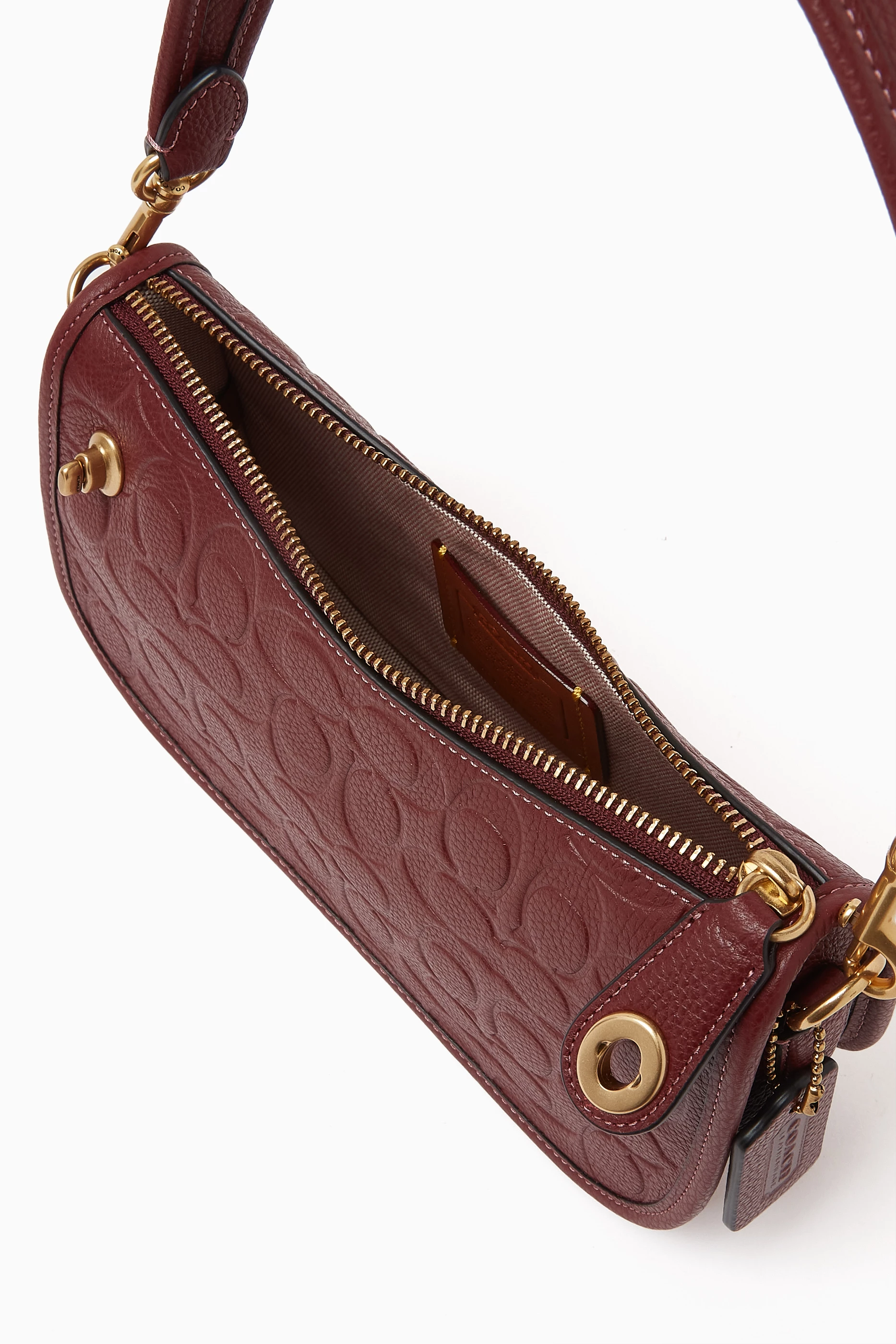 Coach dinky sale shop