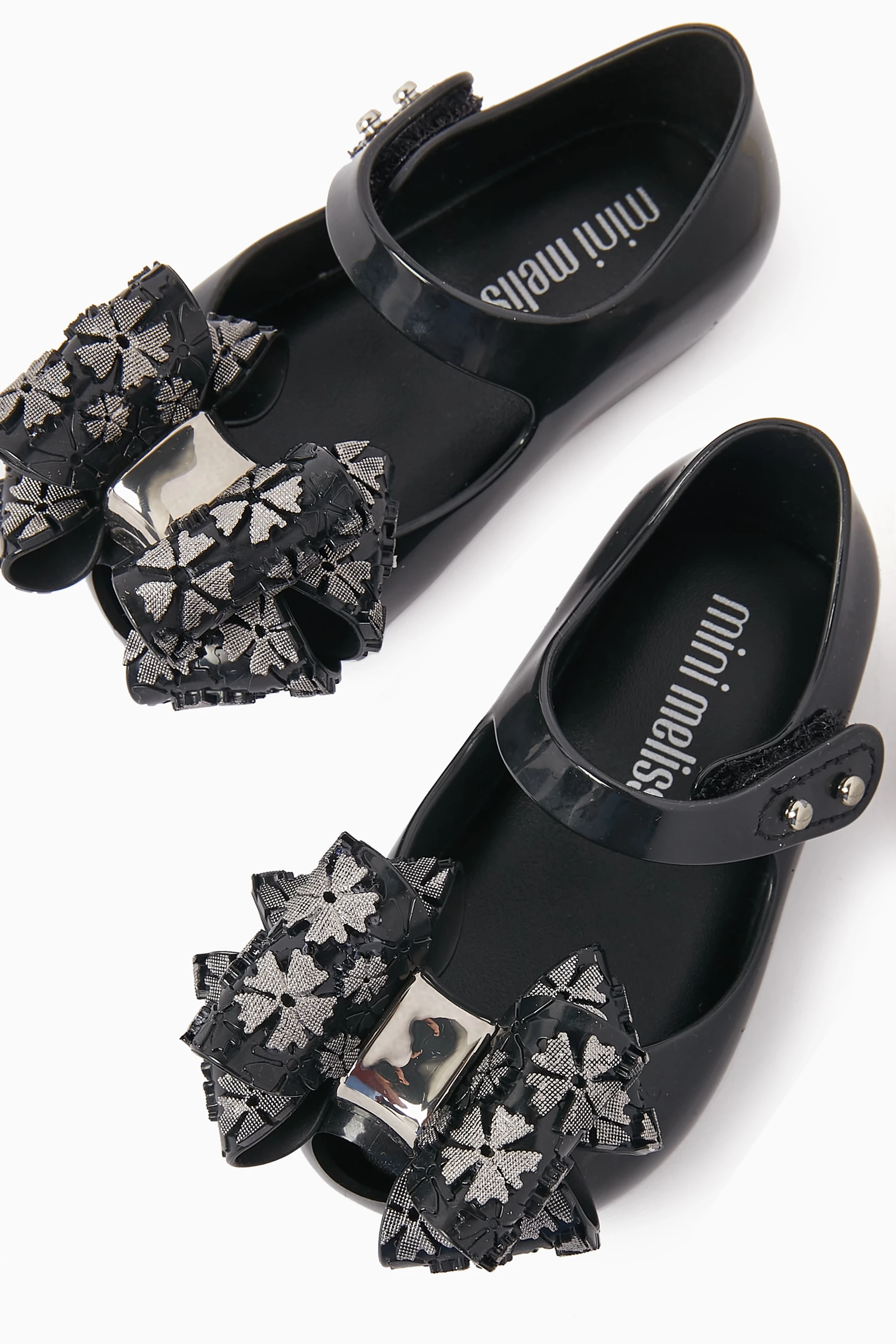 Mini melissa black bow shoes discount