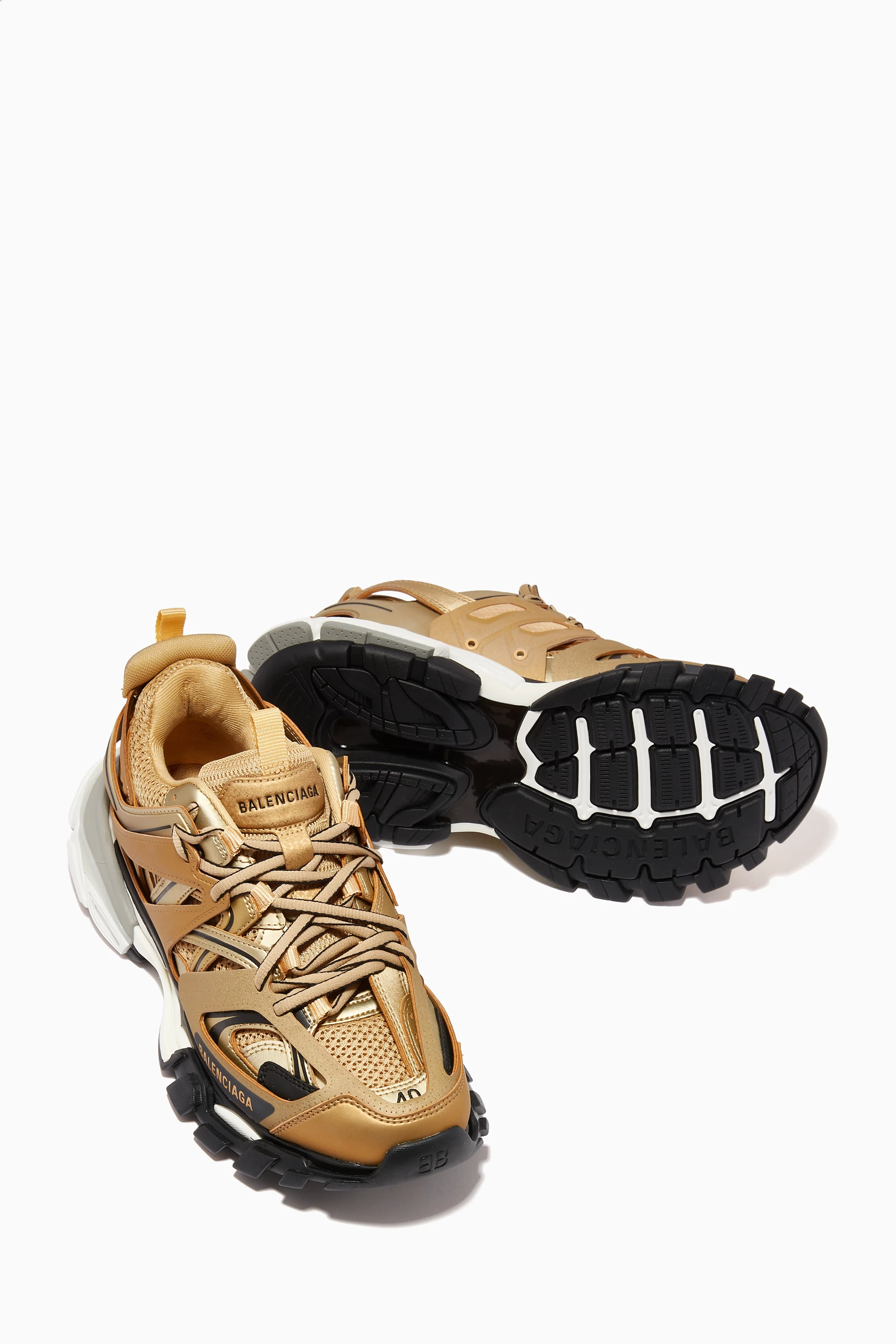 Gold balenciaga sneakers store