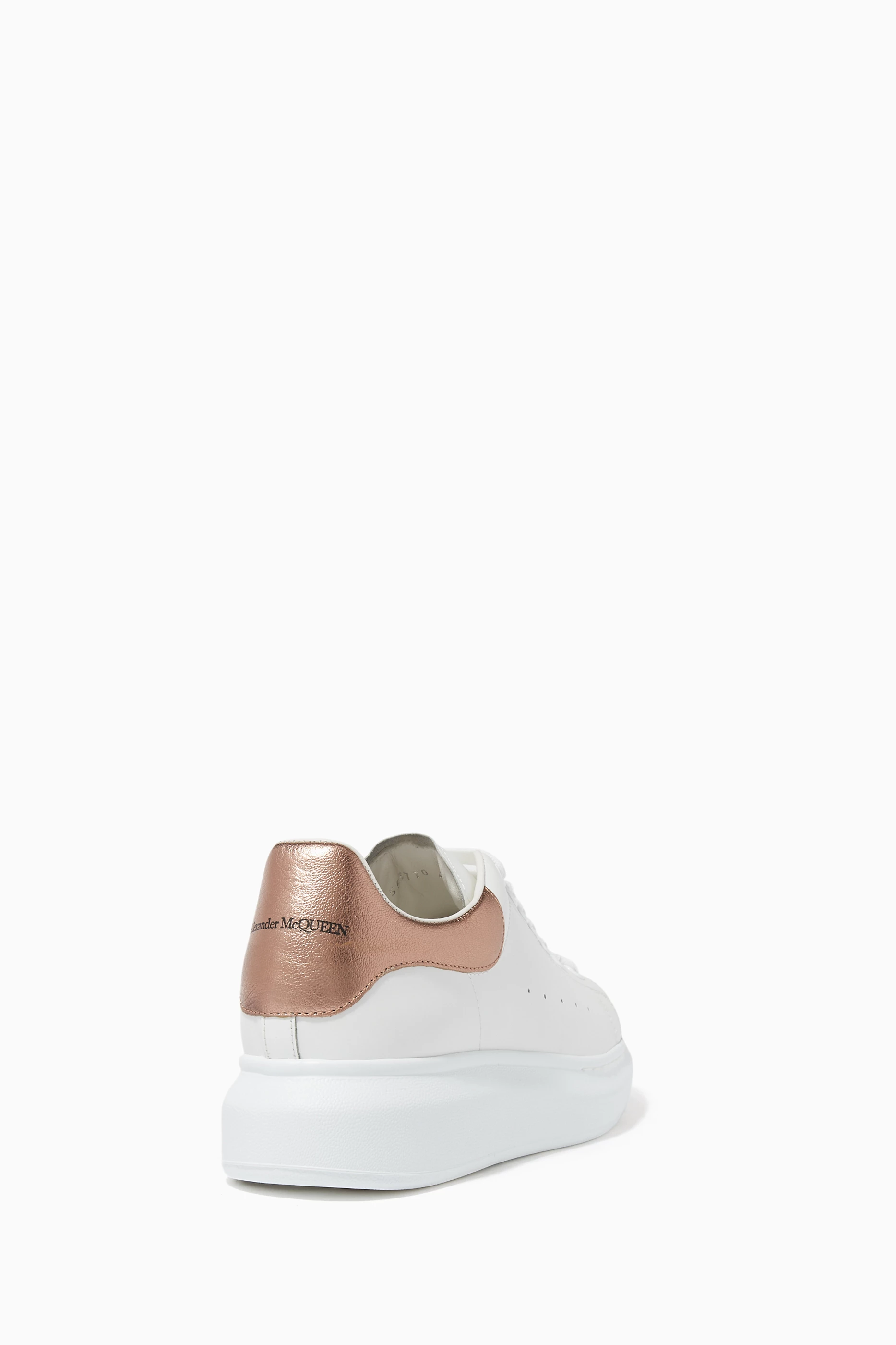 Alexander mcqueen trainers rose gold online