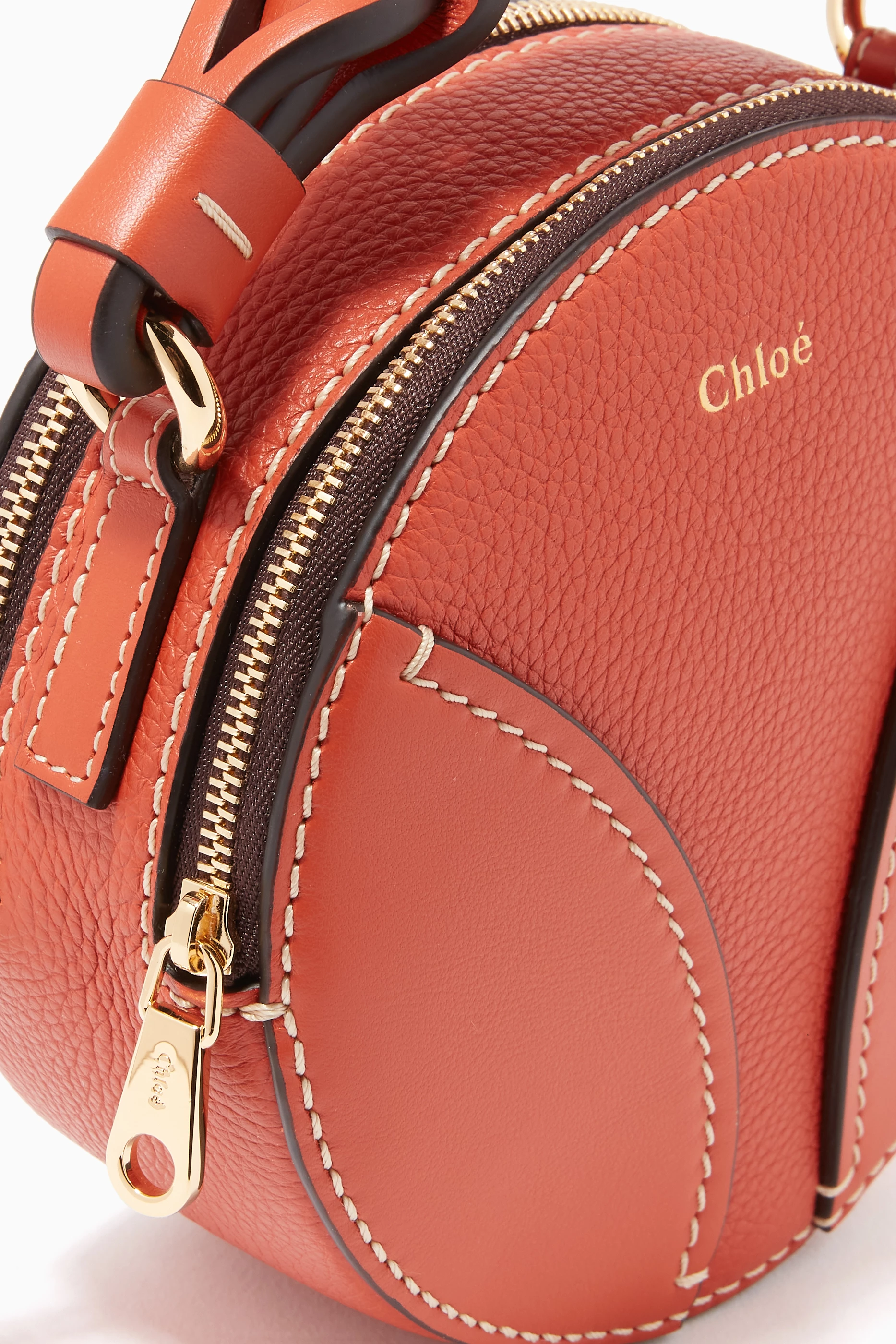 Buy Chloe Orange Mini Daria Round Bag in Grained Shiny Calfskin For Women Online Ounass Saudi