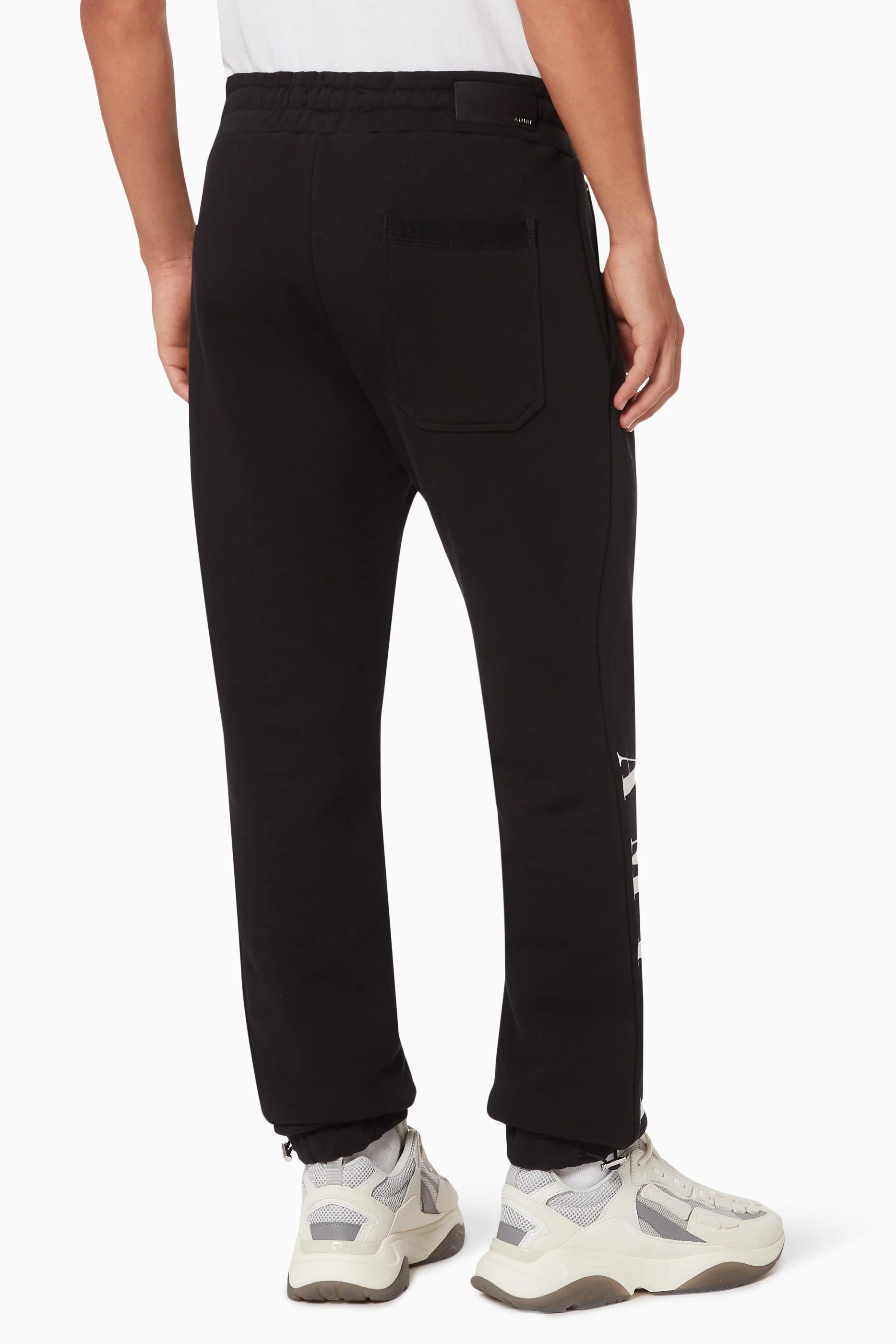 Buy Amiri Black Vertical Logo Crack Ink Sweatpants in Cotton Terry