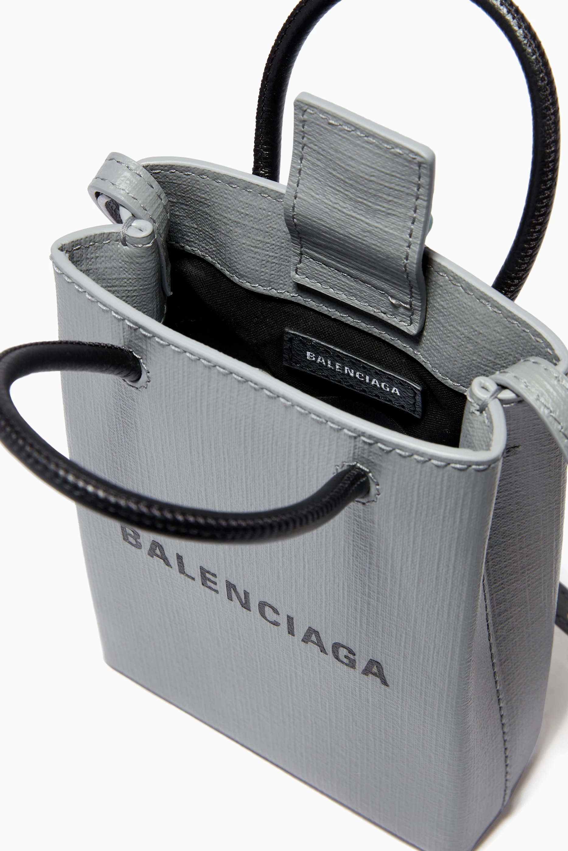 Shopping phone holder balenciaga outlet