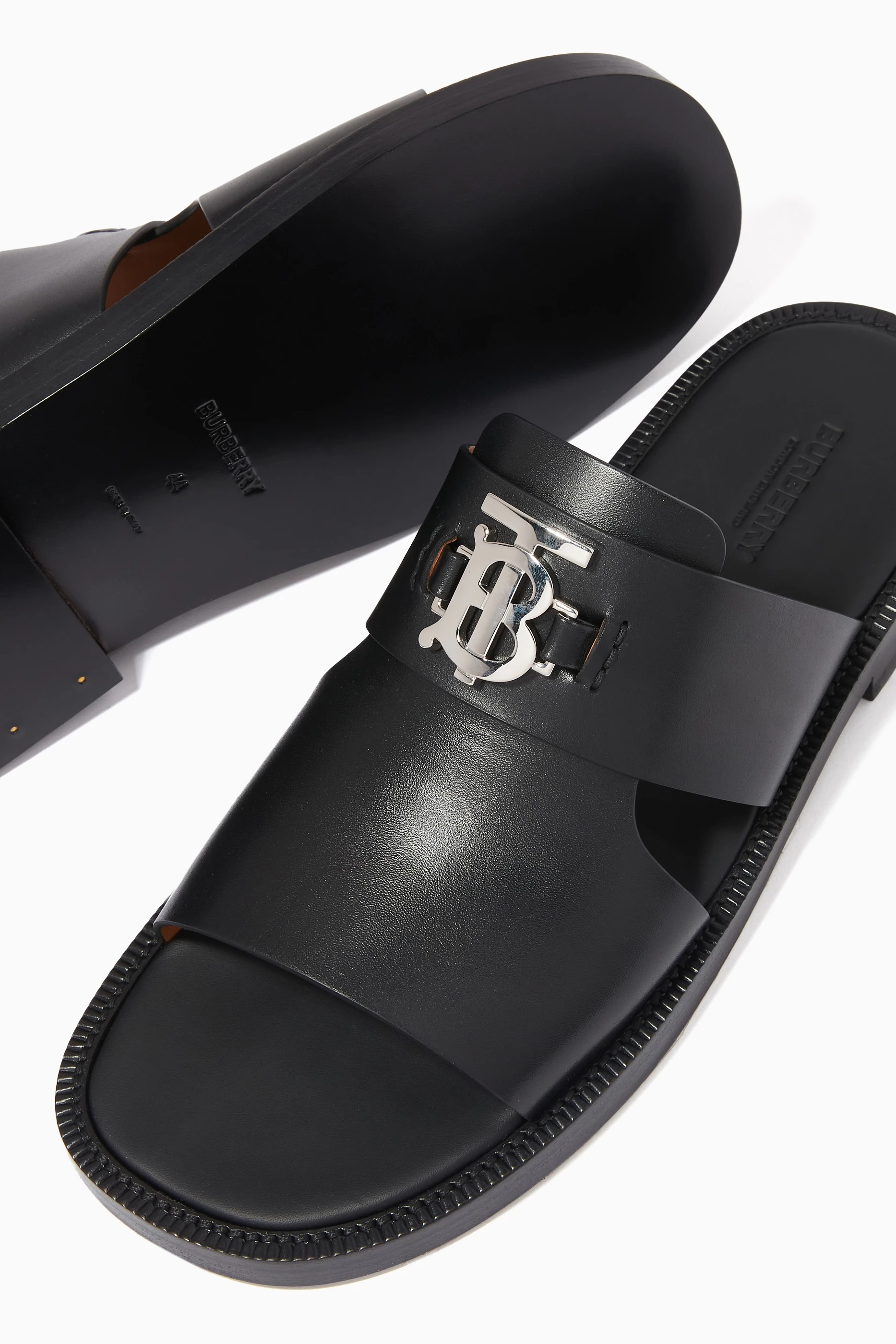Buy Burberry Black Monogram Motif Slide Sandals in Leather For Men Online Ounass Saudi
