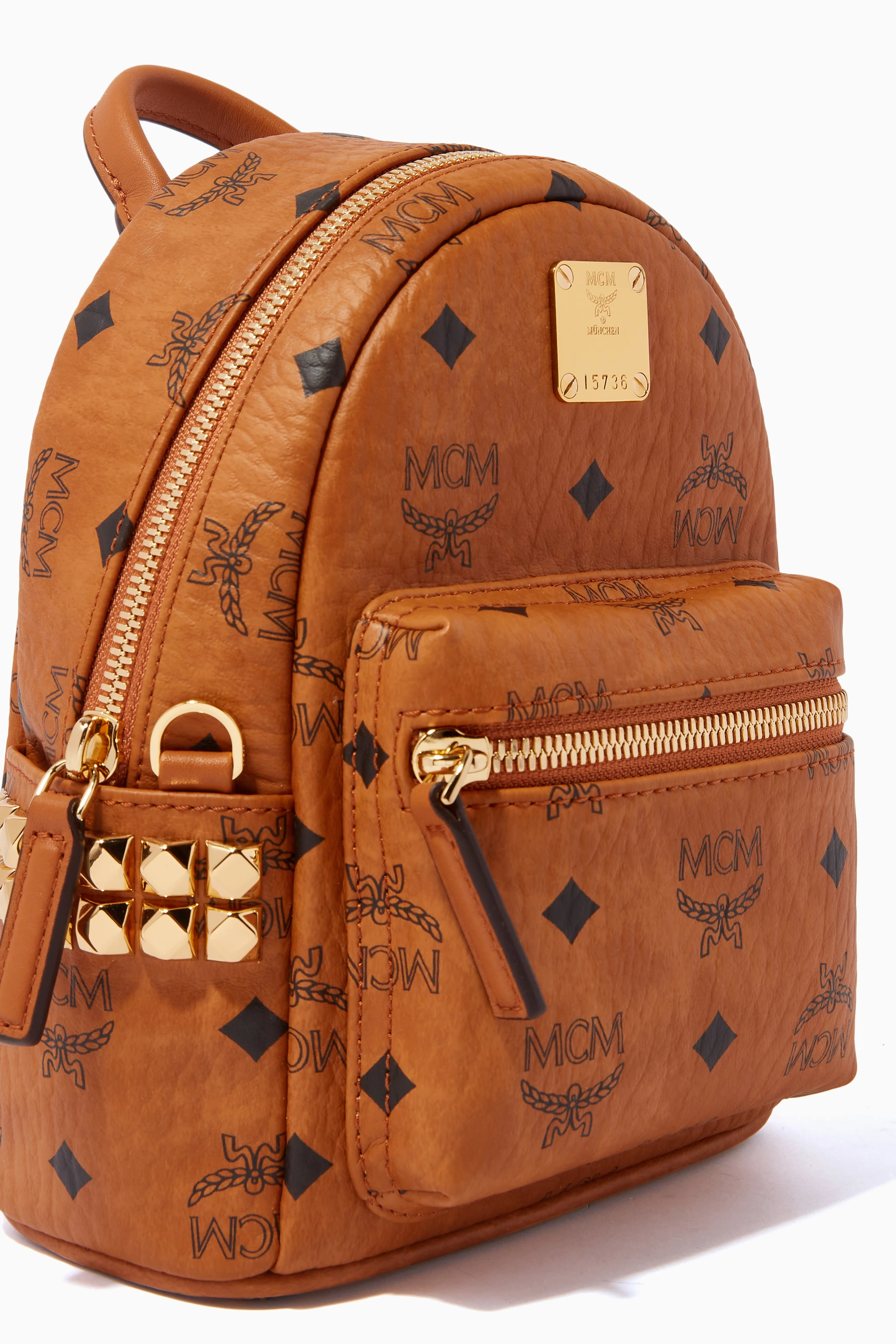 Buy MCM Brown Stark Bebe Boo Side Studs Backpack in Visetos Coated Canvas For Women Online Ounass Saudi