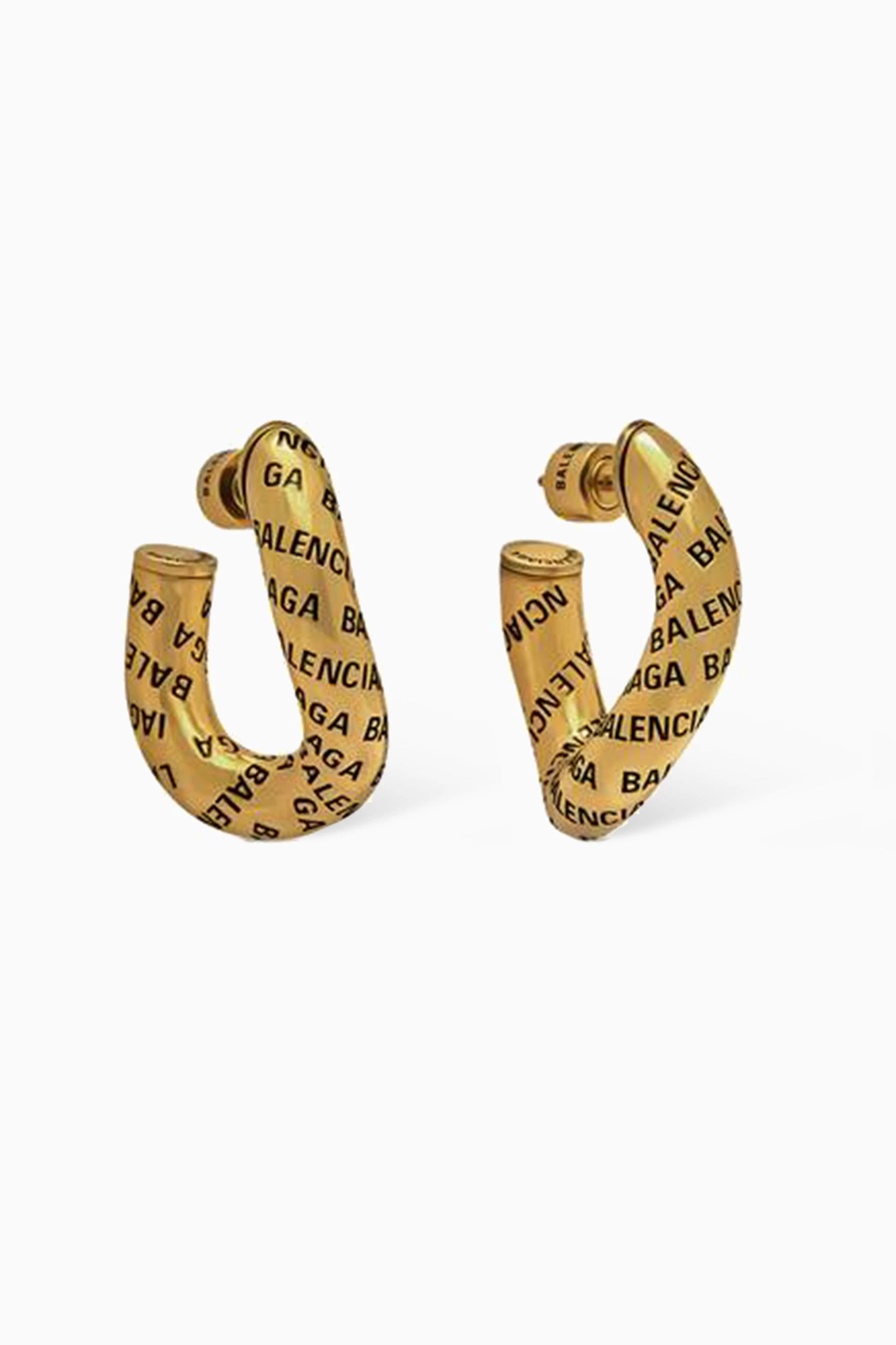 Buy Balenciaga Gold Logo Twist Hoop Earrings in Metal For Women Online Ounass Saudi