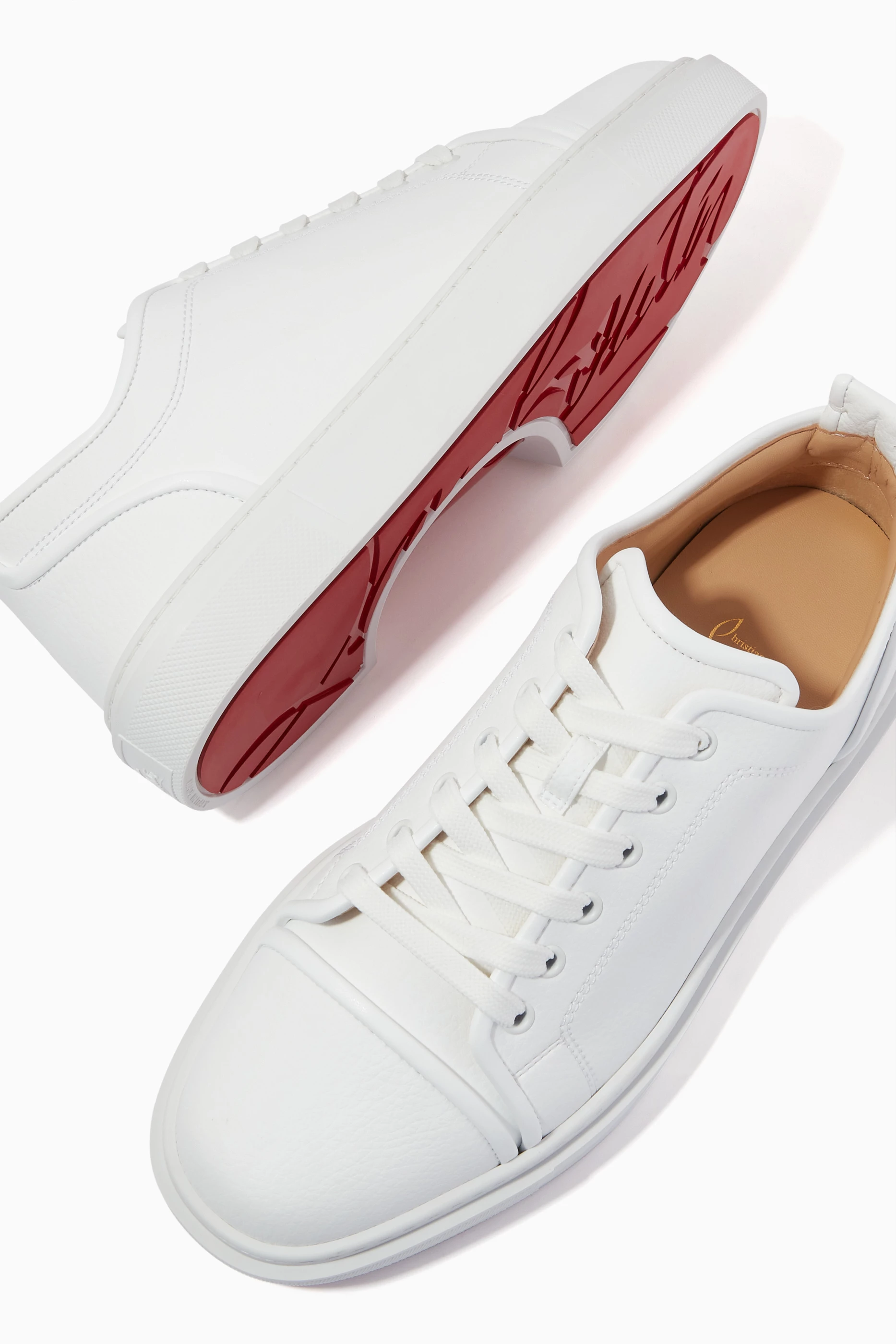Buy Christian Louboutin White Adolon Junior Low top Sneakers in Recycled Grained Leather For Men Online Ounass Saudi