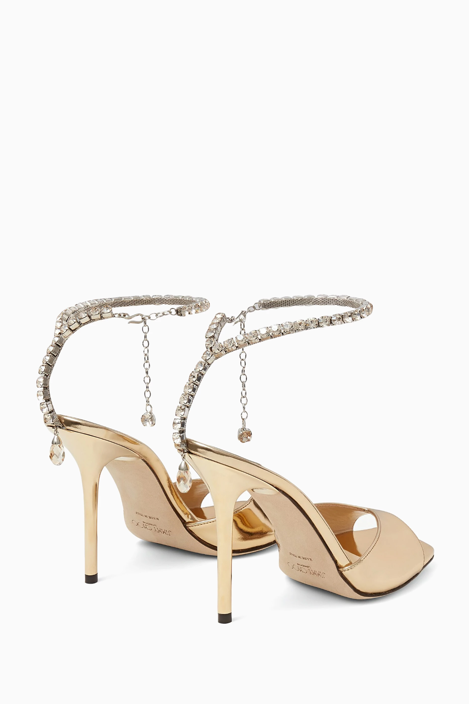Buy Jimmy Choo Gold Saeda 100 Sandals in Metallic Leather