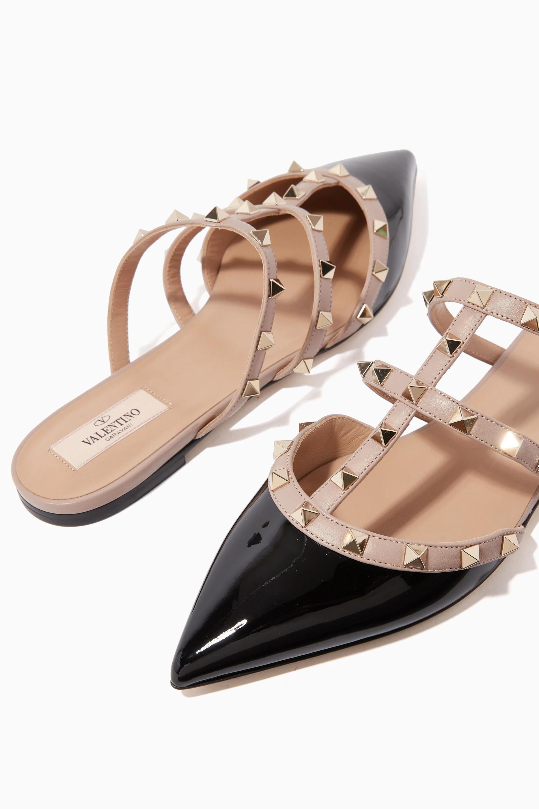 Buy Valentino Garavani Black Rockstud Flat Mules in Patent Leather