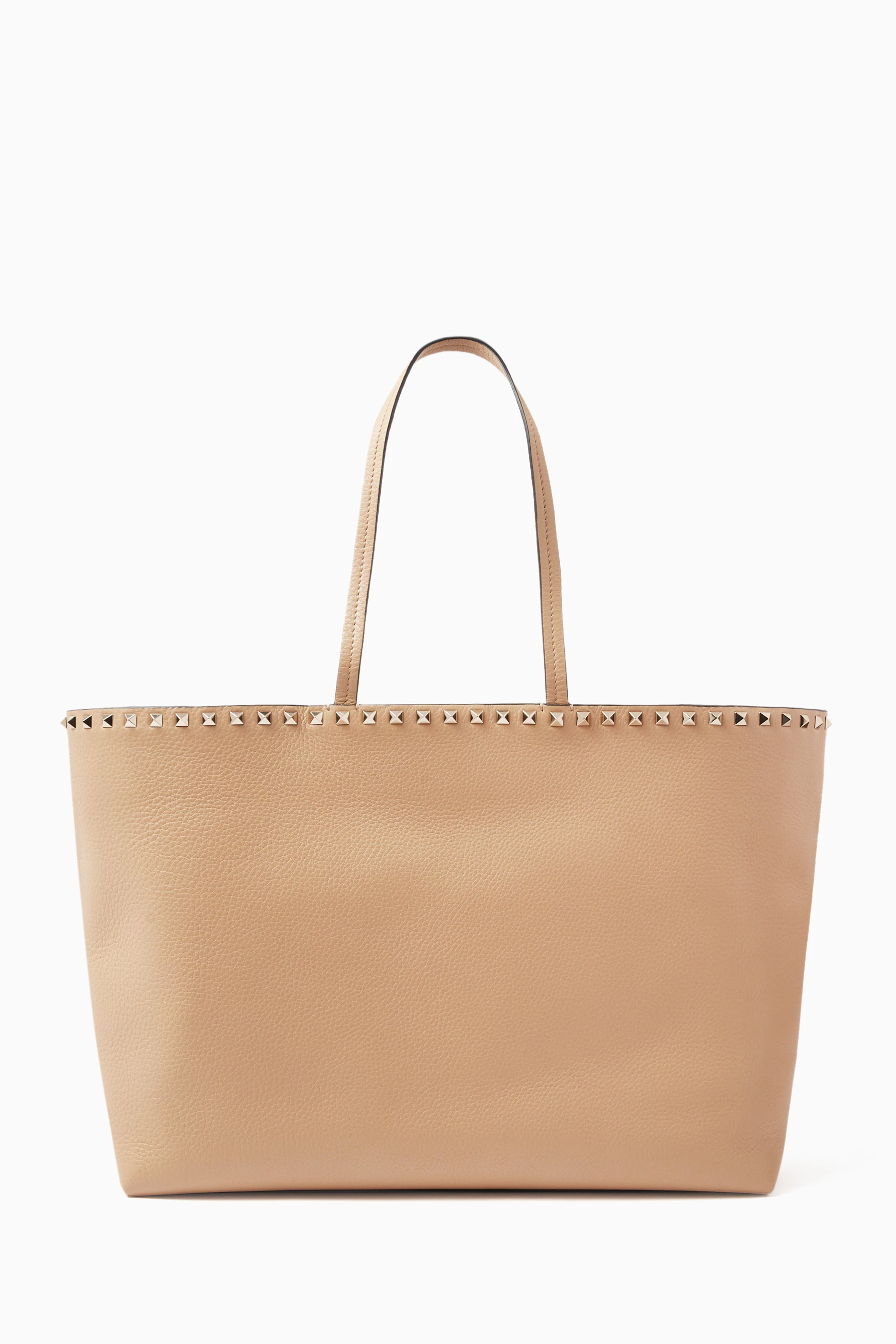 Buy Valentino Garavani Brown Valentino Garavani Medium Grainy Rockstud Tote Bag in Leather For Women Online Ounass Saudi