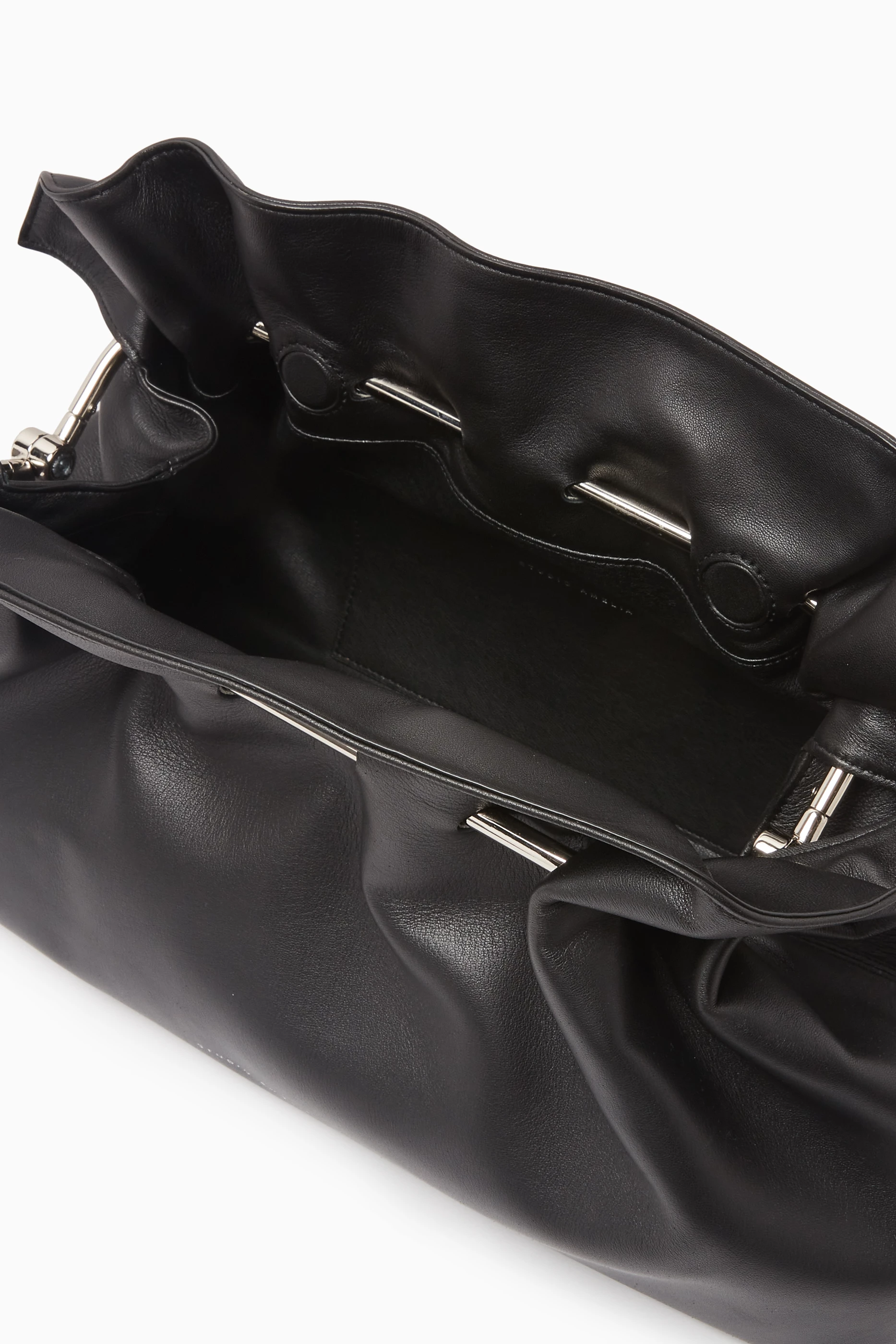 Buy Studio Amelia Black Pierced Maxi Pouch Bag in Nappa