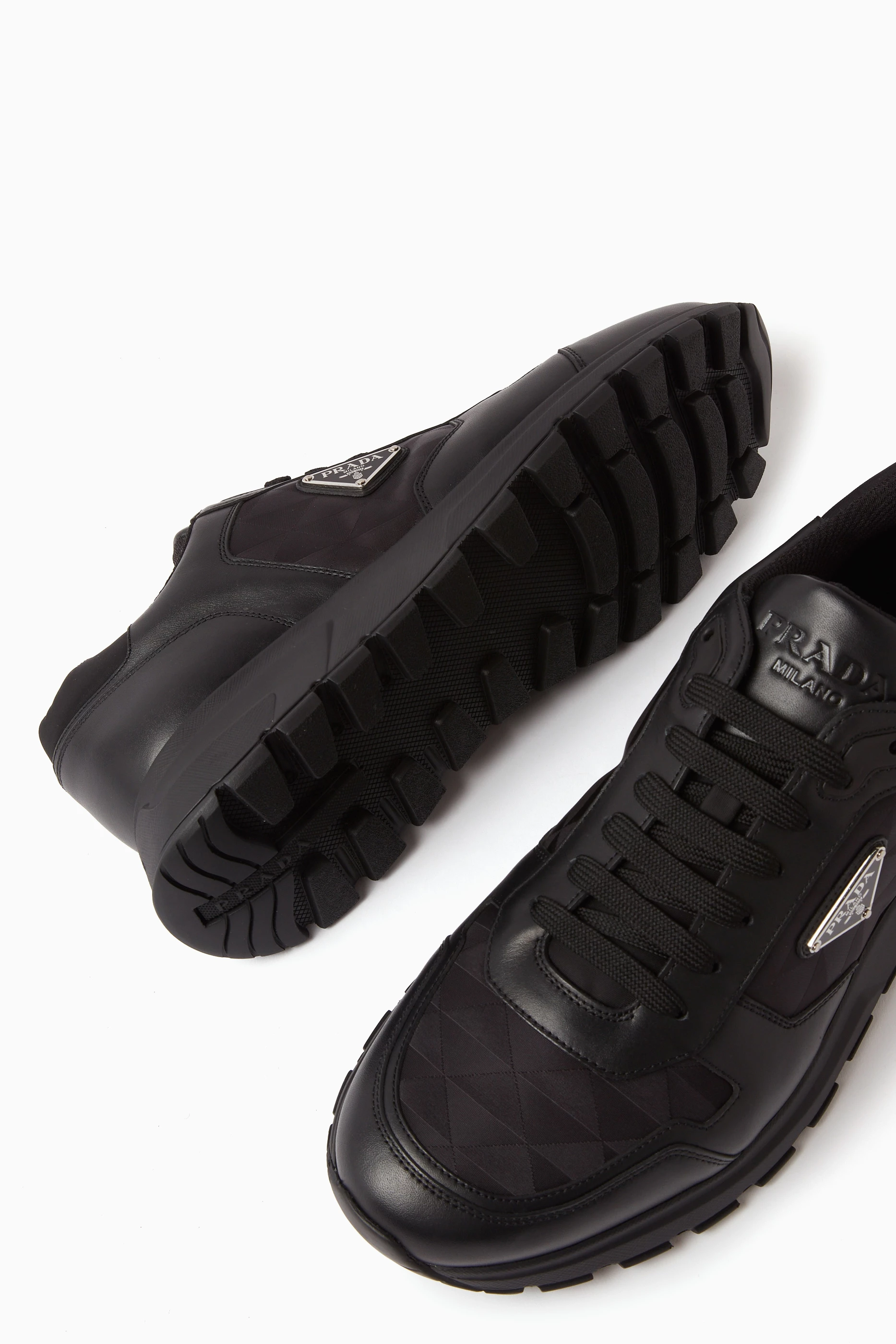 Buy Prada Black Prax 01 Sneakers in Leather For Men Online Ounass Saudi