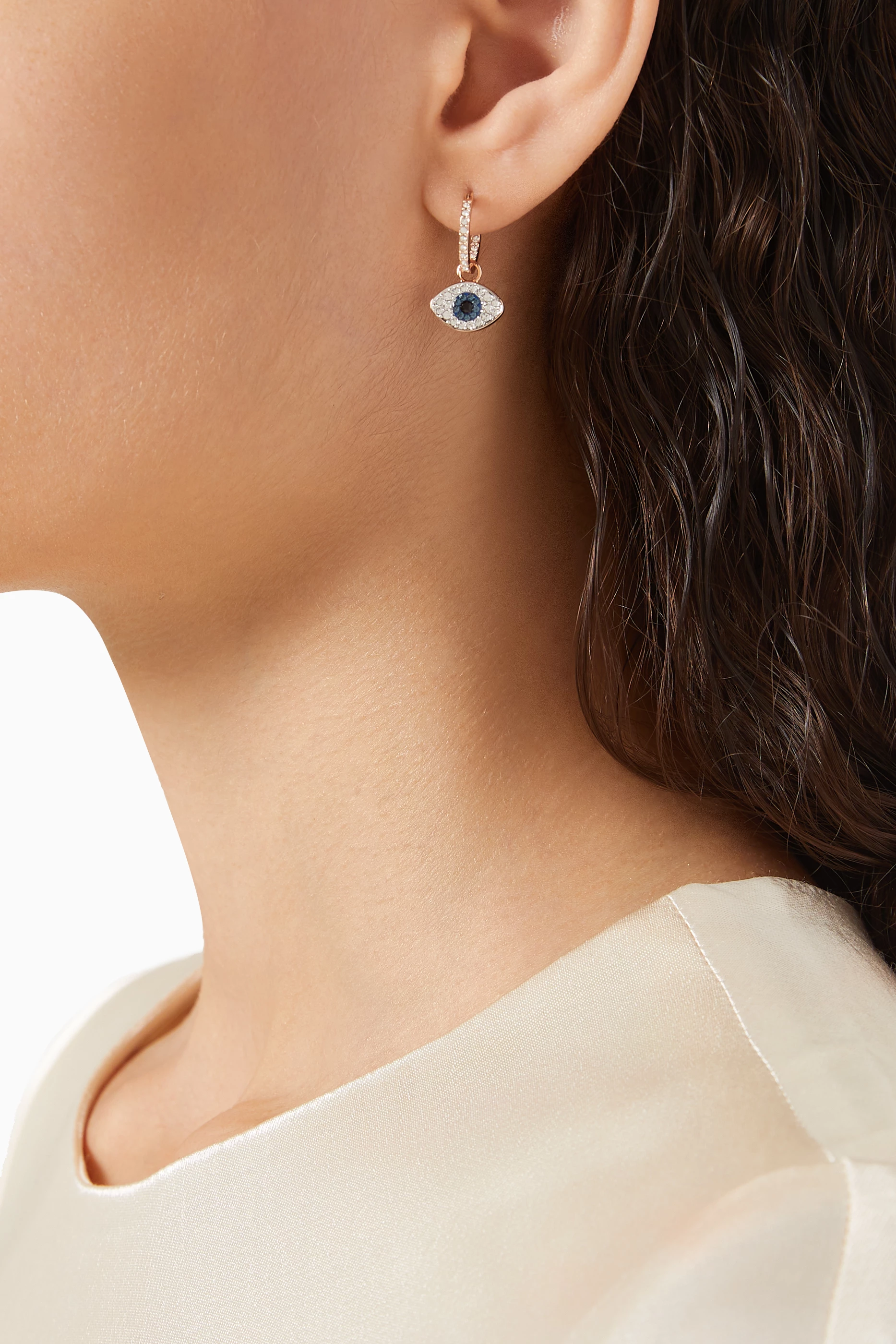 Buy Swarovski Gold Duo Evil Eye Hoop Earrings in Rose Gold plated Metal For Women Online Ounass Saudi
