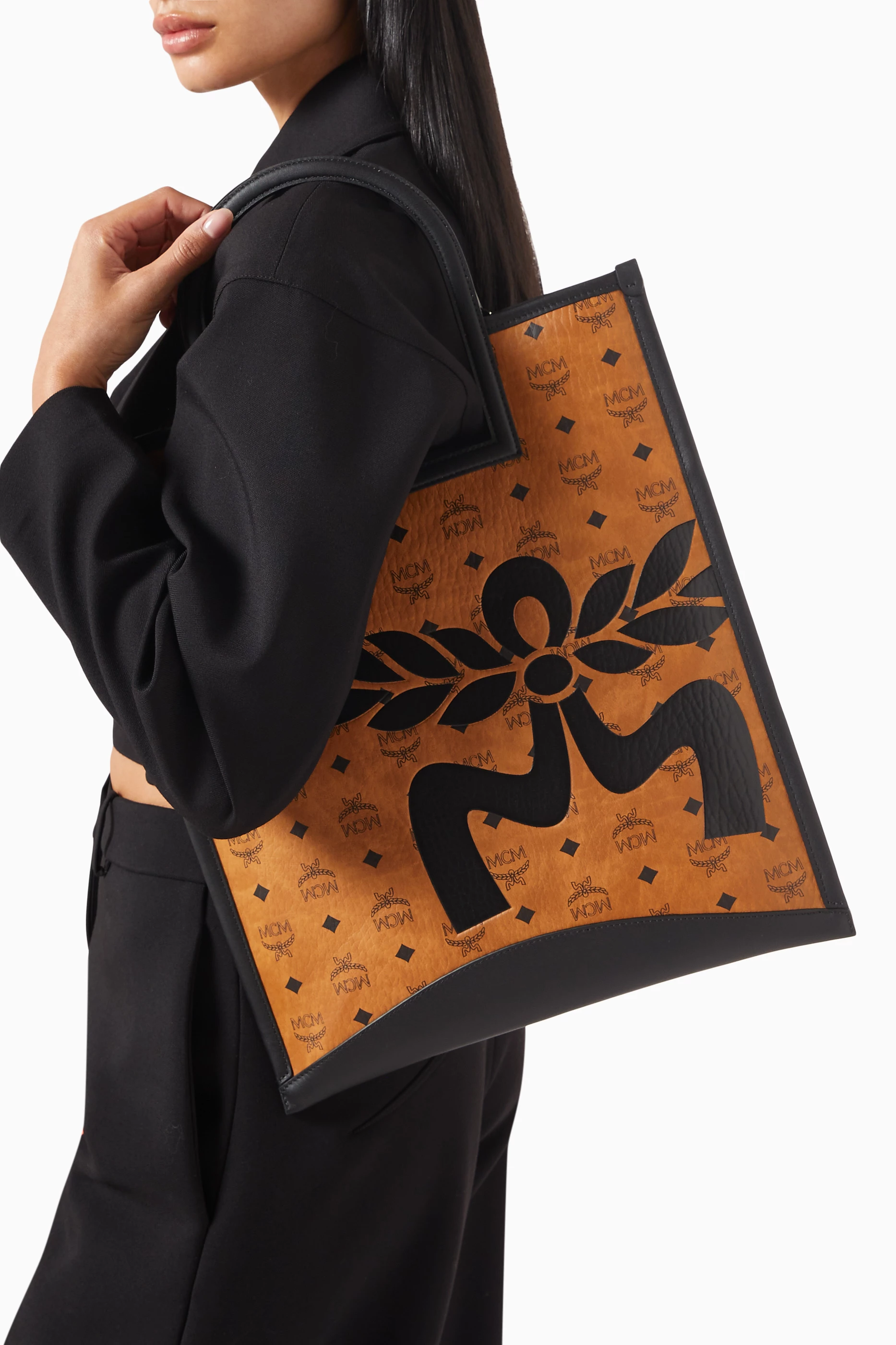 Buy MCM Brown Medium Aren Fold Tote Bag in Mega Laurel Visetos For Women Online Ounass Saudi